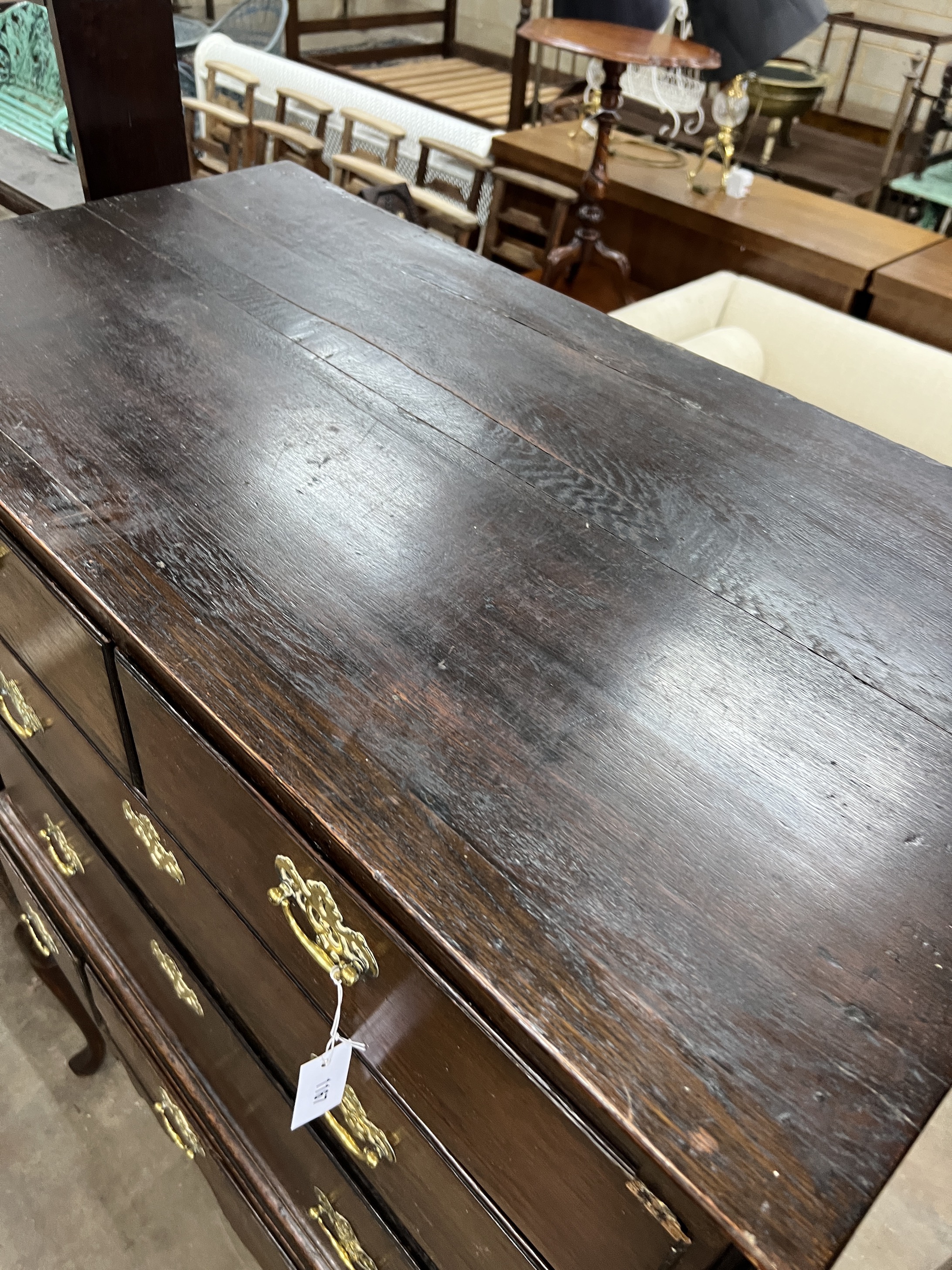 A George III oak chest on stand, width 106cm, depth 58cm, height 144cm